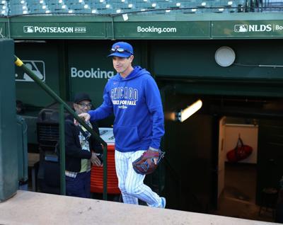 Cubs manager Craig Counsell comes onto the field for a workout at Wrigley Field on Tuesday, Oct. 7, 2025, ahead of Game 3 of the NL Division Series against the Brewers.