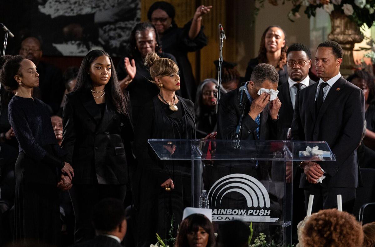 Jackie Jackson, Ashley Jackson, Santita Jackson, and Yusef Jackson stand behind Jesse Jackson Jr. as he cries during his speech during a funeral service for their father, the Rev. Jesse Jackson, at Rainbow PUSH Coalition headquarters in Chicago, March 7...